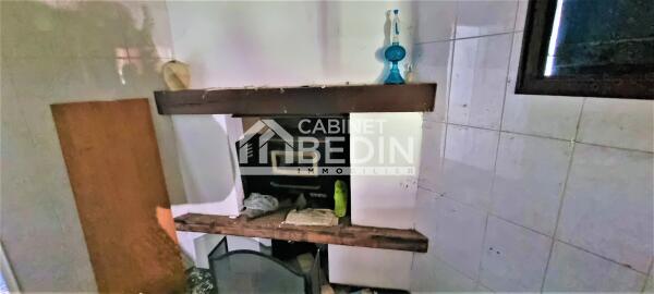 Batiment aménagé à rénover+terrain