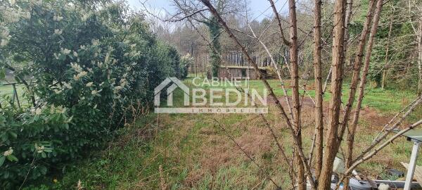 Batiment aménagé à rénover+terrain