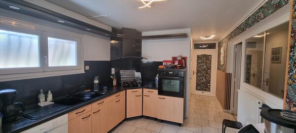Deux logements d'habitation réunis
